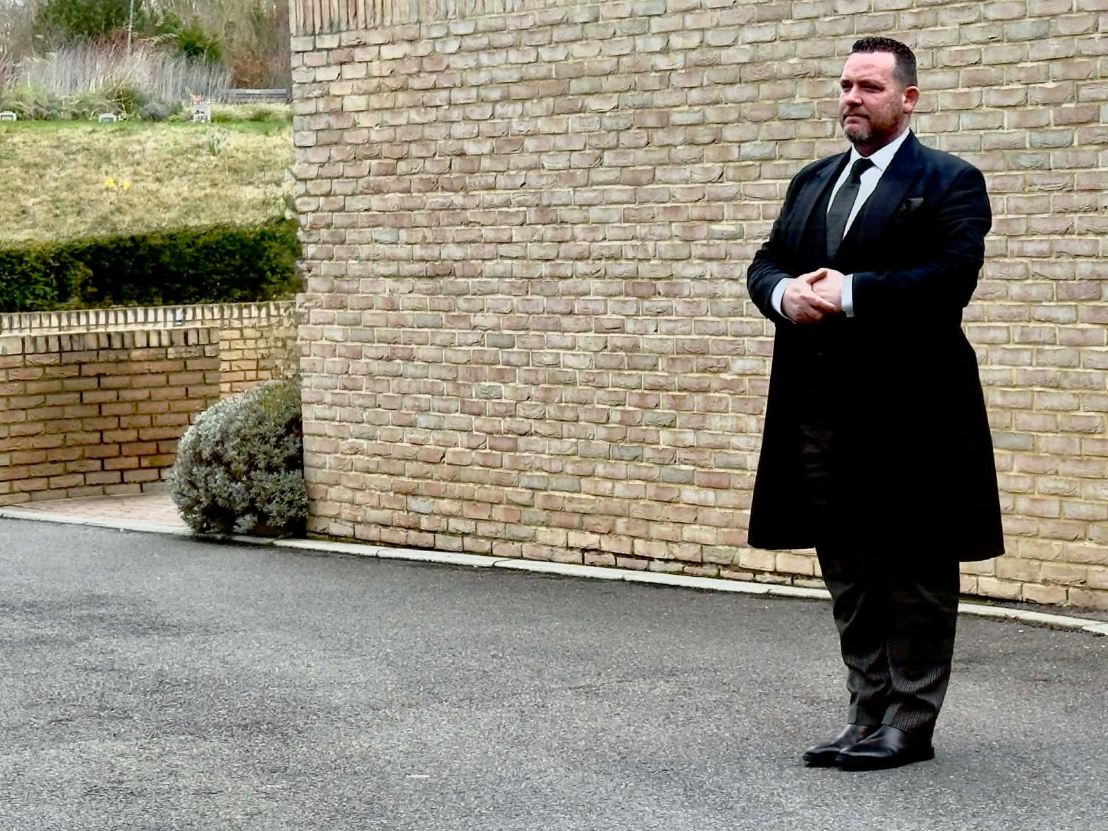 Black hearse at a dignified funeral service in Sittingbourne, Kent