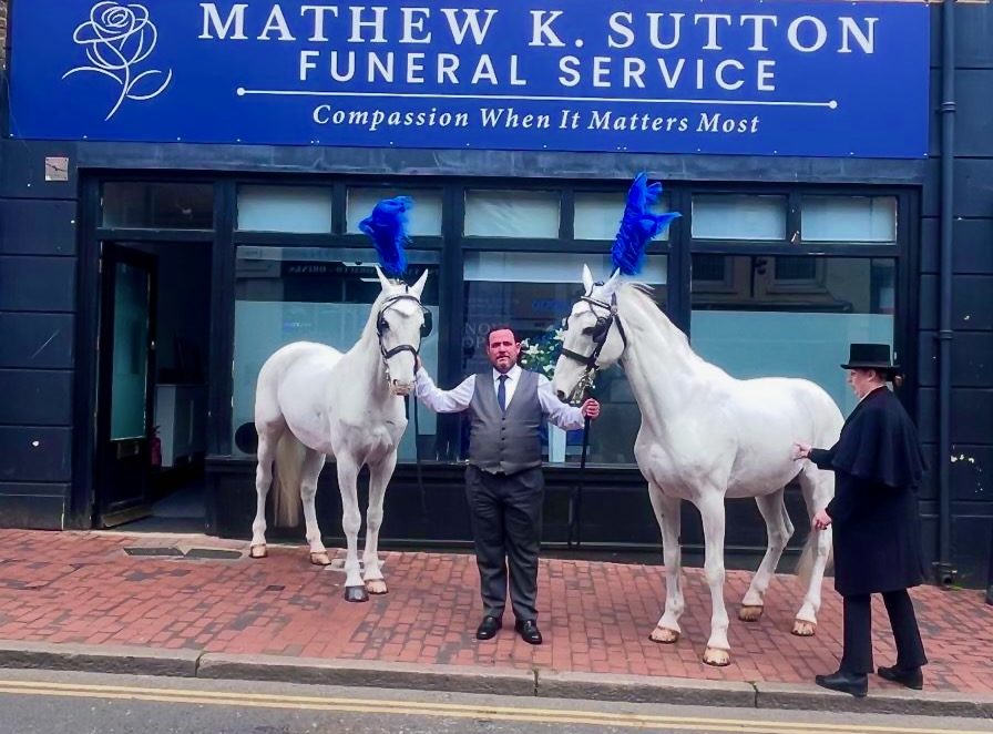 Horse-drawn hearse funeral procession offered by Mathew K Sutton Funeral Service, Kent